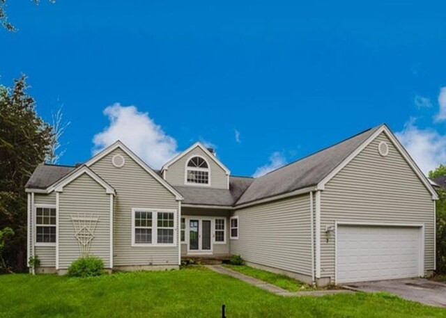 7 Cornwell St, Poughquag, NY 12570 - view of front of house with a front lawn, a garage, and driveway