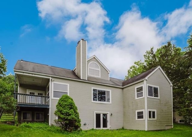 7 Cornwell St, Poughquag, NY 12570 - rear view of property with a lawn, a chimney, and a wooden deck