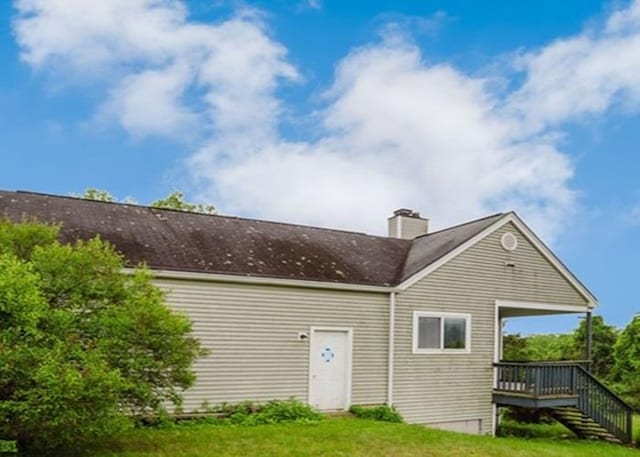 7 Cornwell St, Poughquag, NY 12570 - back of house featuring a lawn, a wooden deck, and a chimney