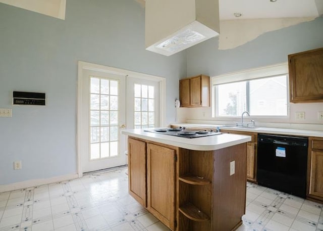 7 Cornwell St, Poughquag, NY 12570 - kitchen featuring black appliances, light flooring, a kitchen island, plenty of natural light, and high vaulted ceiling