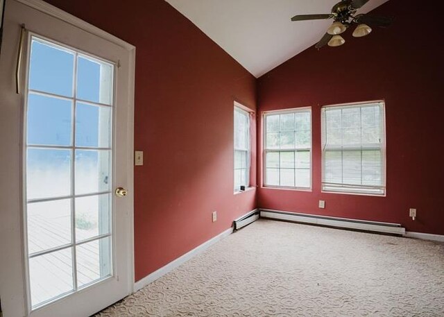 7 Cornwell St, Poughquag, NY 12570 - carpeted spare room with a baseboard heating unit, a ceiling fan, vaulted ceiling, and plenty of natural light
