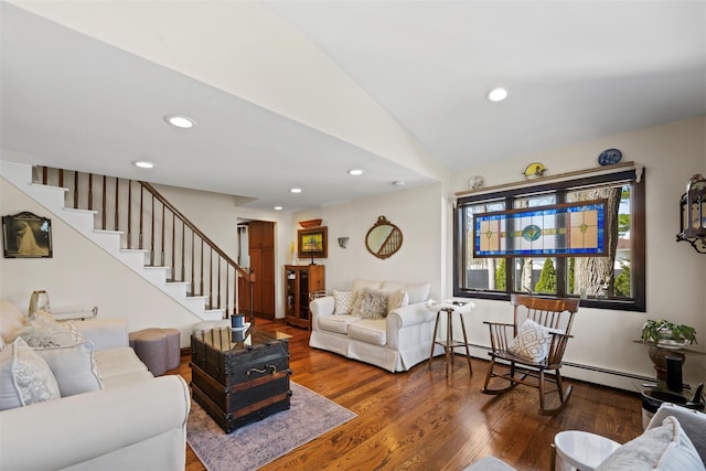 living room featuring recessed lighting, stairway, vaulted ceiling, baseboard heating, and wood finished floors