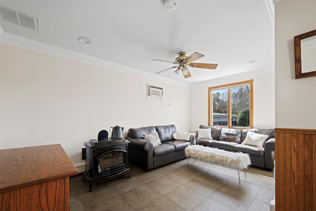 living room featuring a wood stove, crown molding, a ceiling fan, visible vents, and an AC wall unit