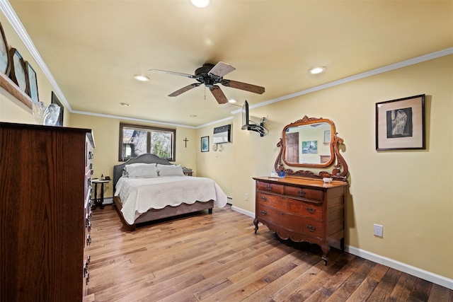 bedroom with hardwood / wood-style floors, recessed lighting, ornamental molding, and baseboards