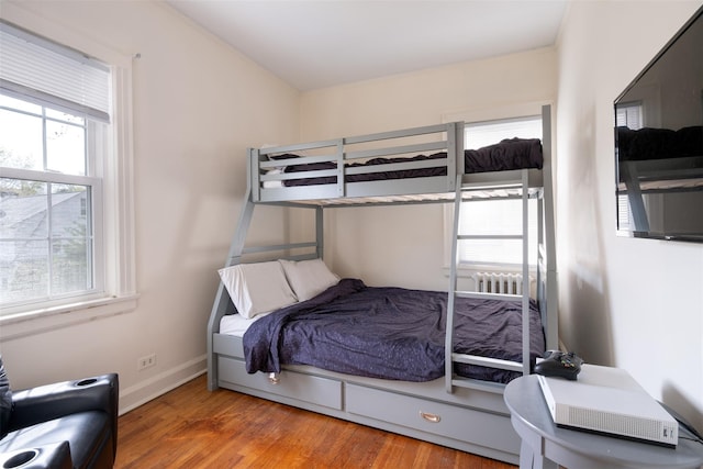 1065 Washington Ave, Pelham, NY 10803 - bedroom featuring wood finished floors and baseboards