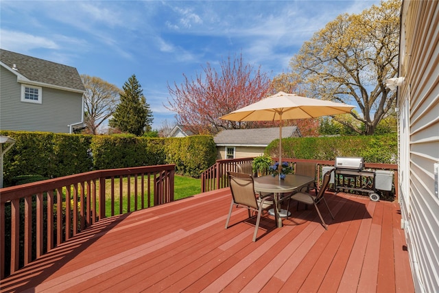 deck featuring outdoor dining space
