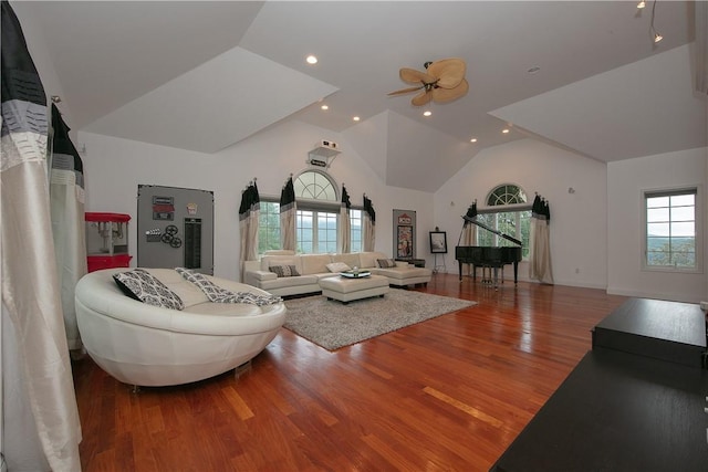 living area with recessed lighting, ceiling fan, wood finished floors, and lofted ceiling