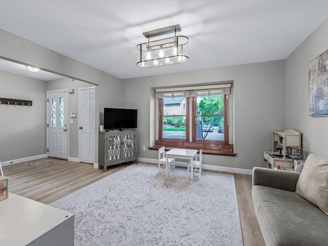 54 Hidden Ridge Dr, Syosset, NY 11791 - living room with baseboards and wood finished floors