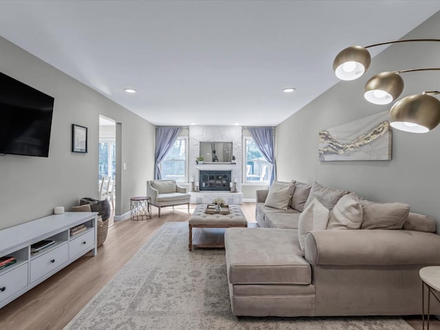 54 Hidden Ridge Dr, Syosset, NY 11791 - living area featuring recessed lighting, baseboards, wood finished floors, and a fireplace