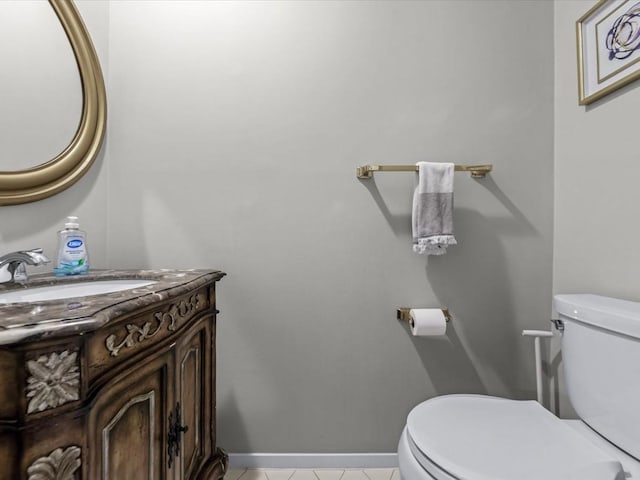 54 Hidden Ridge Dr, Syosset, NY 11791 - bathroom with baseboards, vanity, tile patterned flooring, and toilet