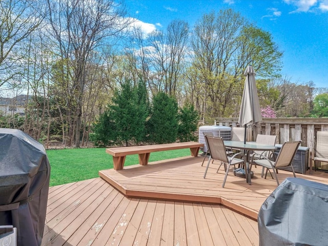 54 Hidden Ridge Dr, Syosset, NY 11791 - wooden terrace with outdoor dining area, a yard, and area for grilling