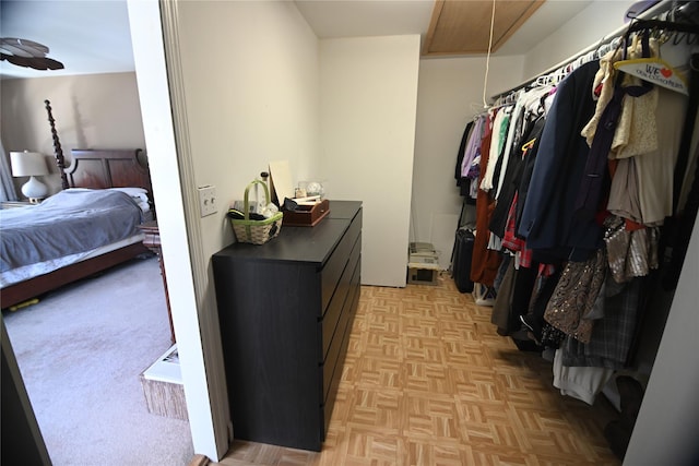 spacious closet featuring attic access