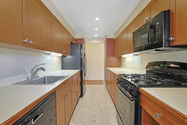 1270 N Ave Unit 3E, New Rochelle, NY 10804 - kitchen with black appliances, a sink, recessed lighting, light countertops, and brown cabinetry