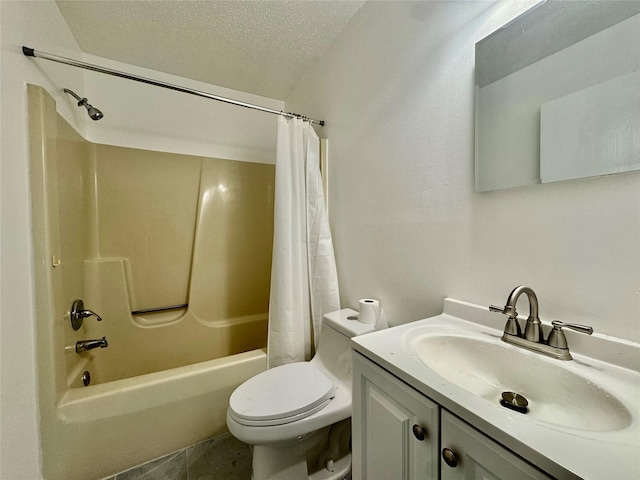 full bath featuring tile patterned floors, a textured ceiling, toilet, shower / bath combo with shower curtain, and vanity