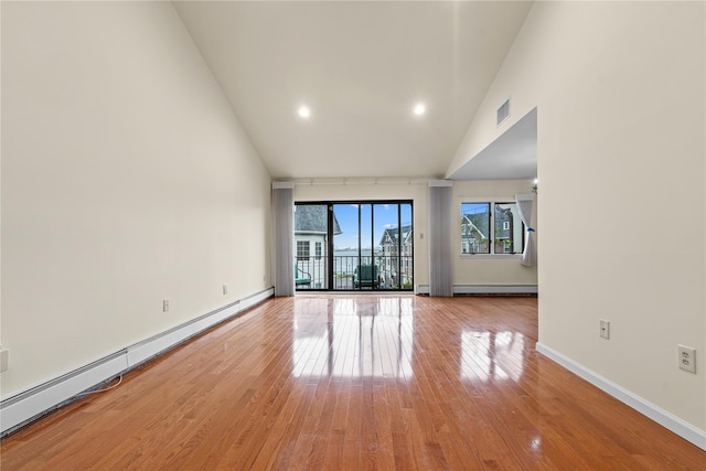 120-06 Riviera Ct Unit 17B, College Point, NY 11356 - unfurnished room featuring baseboard heating, high vaulted ceiling, light wood-type flooring, baseboards, and recessed lighting