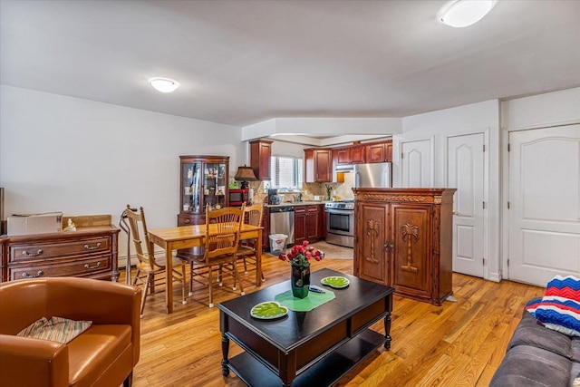 6147 Grand Ave, Maspeth, NY 11378 - living room with light wood finished floors