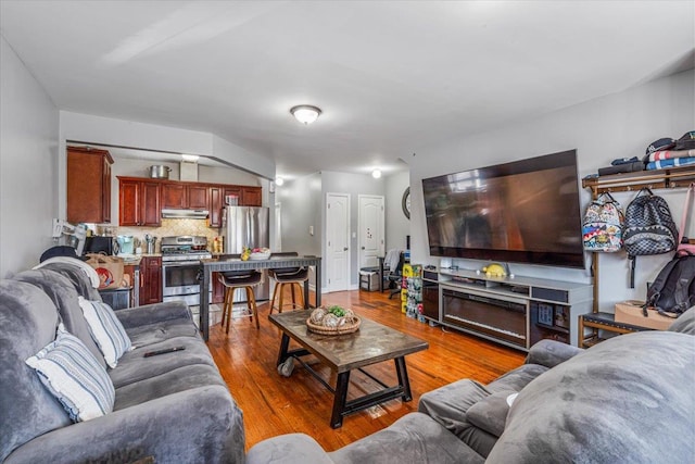 6147 Grand Ave, Maspeth, NY 11378 - living area with wood finished floors