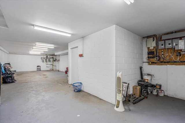 6147 Grand Ave, Maspeth, NY 11378 - garage with concrete block wall and electric panel