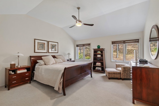 bedroom with light carpet, ceiling fan, and vaulted ceiling
