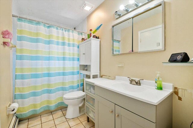 bathroom featuring a shower with curtain, vanity, toilet, tile patterned flooring, and baseboard heating