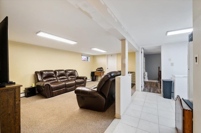 living room featuring a baseboard radiator, light tile patterned floors, and light carpet