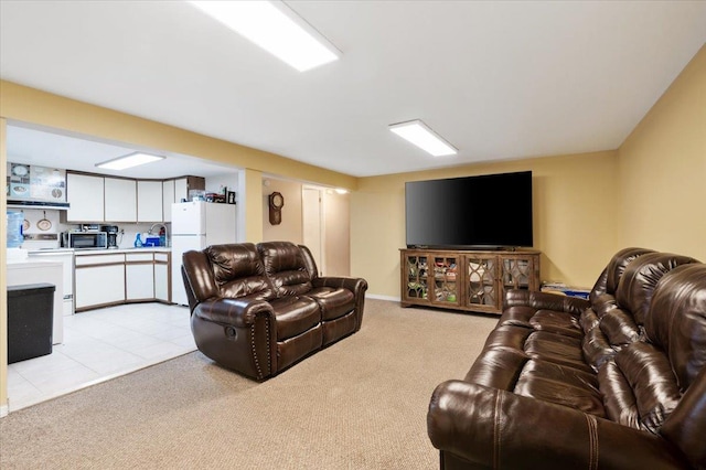 living area with light colored carpet