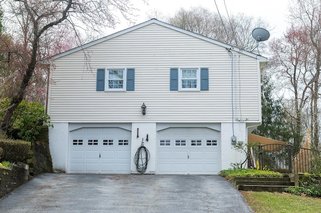 125 Tick Tock Way, Stanfordville, NY 12581 - view of side of home with asphalt driveway and a garage