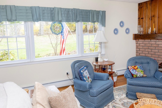 125 Tick Tock Way, Stanfordville, NY 12581 - sitting room with a baseboard radiator and wood finished floors