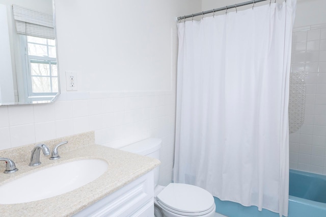 125 Tick Tock Way, Stanfordville, NY 12581 - full bathroom with toilet, tile walls, vanity, and shower / tub combo