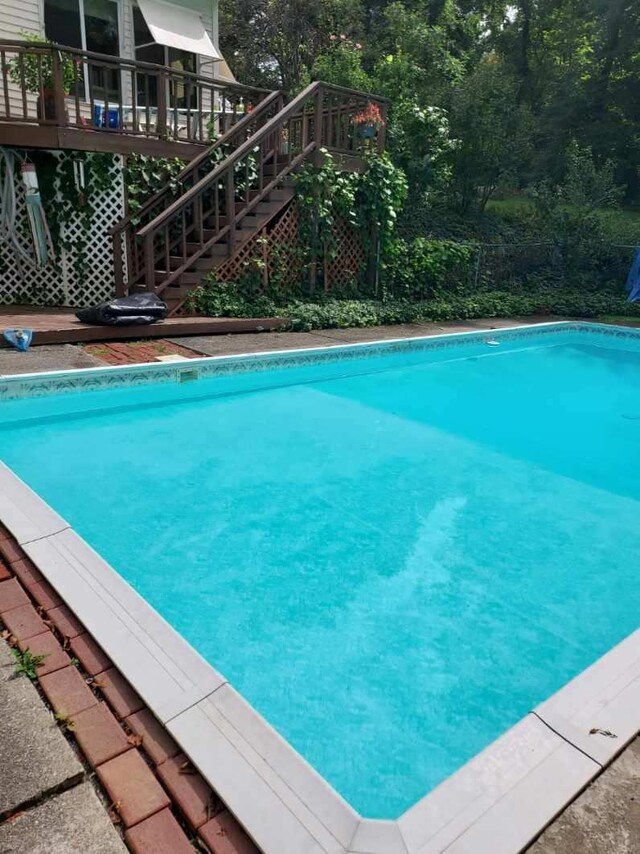 125 Tick Tock Way, Stanfordville, NY 12581 - outdoor pool with stairway and a deck