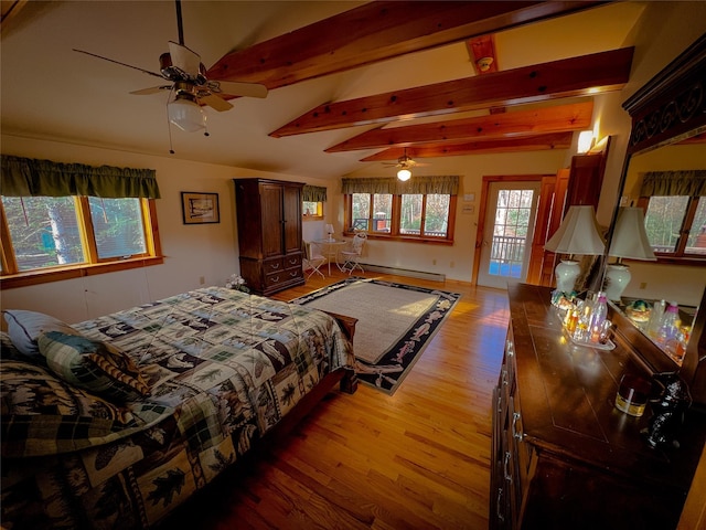 bedroom featuring a baseboard heating unit, light wood-style floors, vaulted ceiling with beams, and access to outside