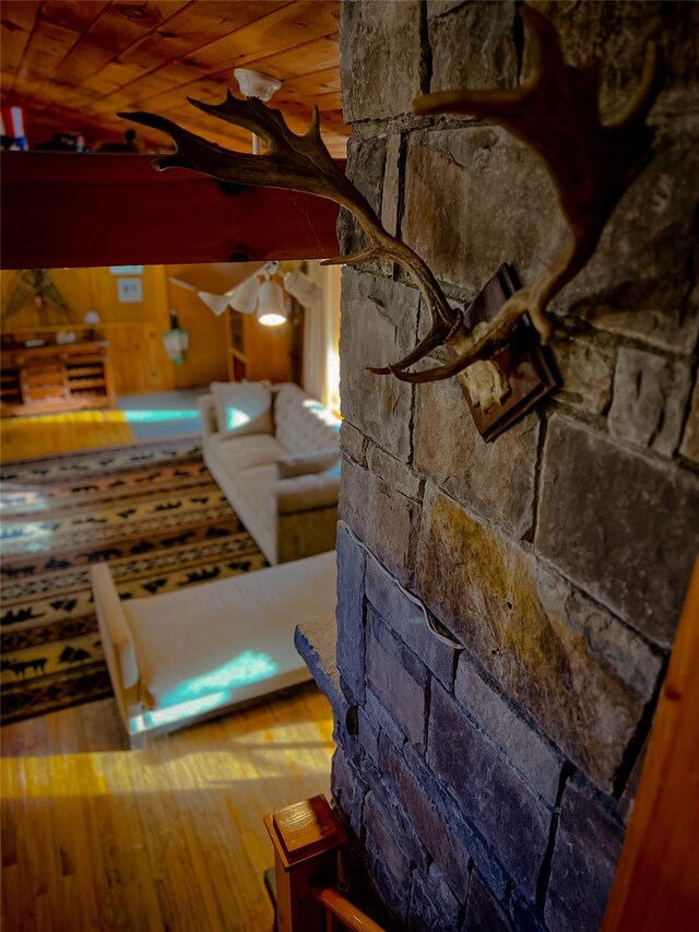 details featuring wood ceiling and wood finished floors