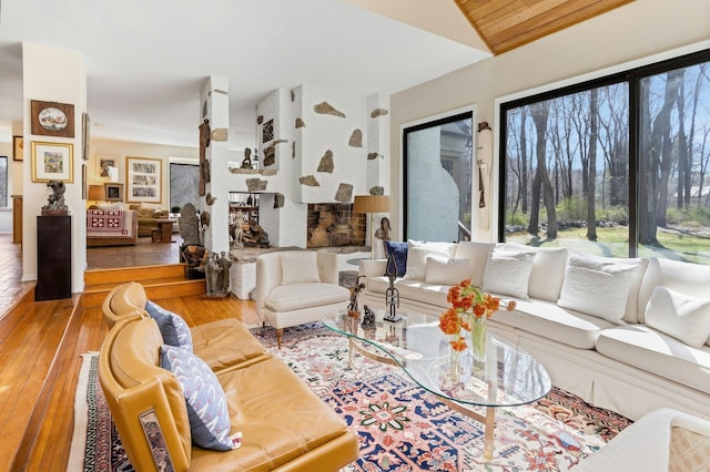 20 Schoolhouse Rd, Waccabuc, NY 10597 - living area with lofted ceiling and hardwood / wood-style flooring