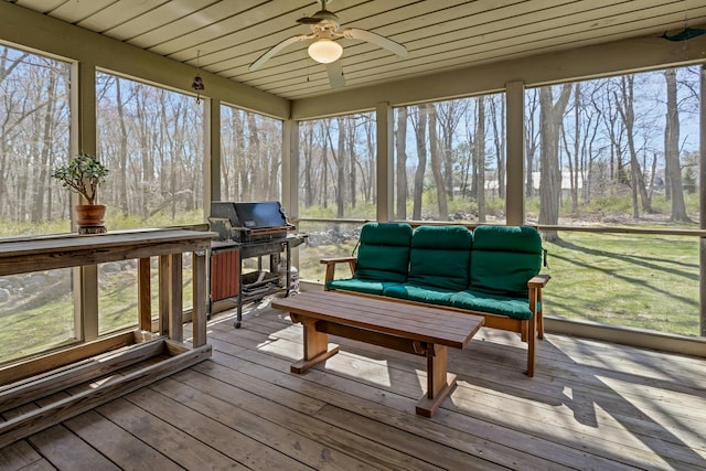 20 Schoolhouse Rd, Waccabuc, NY 10597 - sunroom featuring hardwood / wood-style floors, ceiling fan, an outdoor living space, and a deck