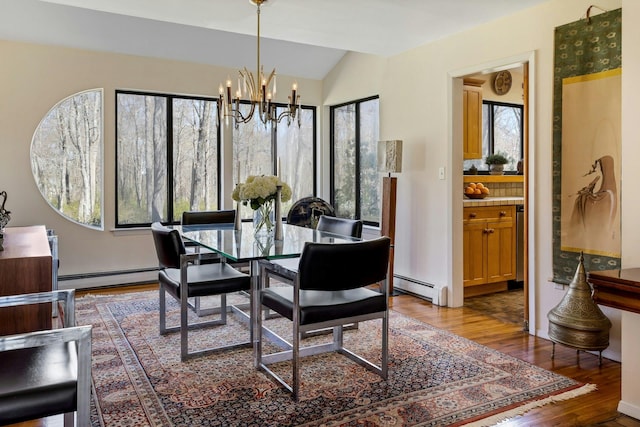 20 Schoolhouse Rd, Waccabuc, NY 10597 - dining area featuring wood finished floors, lofted ceiling, baseboard heating, and a notable chandelier