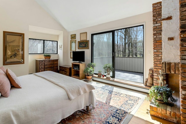 20 Schoolhouse Rd, Waccabuc, NY 10597 - bedroom with wood finished floors, access to outside, a baseboard radiator, and high vaulted ceiling