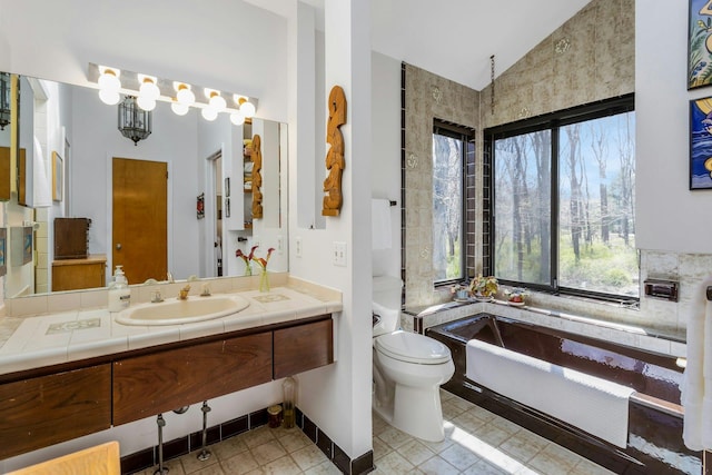 20 Schoolhouse Rd, Waccabuc, NY 10597 - bathroom with a healthy amount of sunlight, toilet, vanity, and a tub