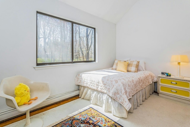 20 Schoolhouse Rd, Waccabuc, NY 10597 - bedroom with a baseboard heating unit and lofted ceiling