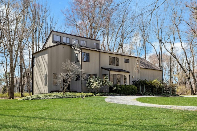 20 Schoolhouse Rd, Waccabuc, NY 10597 - view of front facade with a front yard