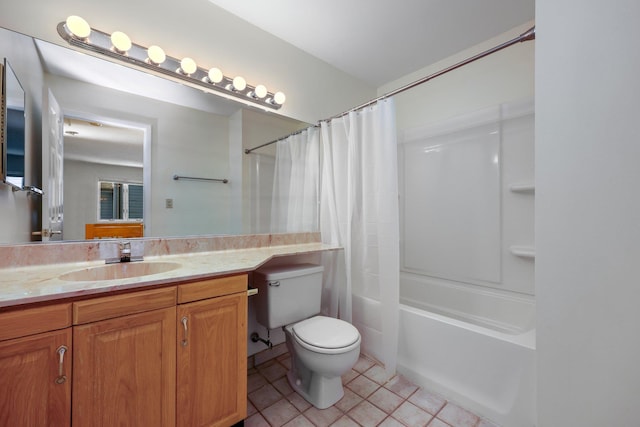 full bath with toilet, tile patterned floors, shower / tub combo, and vanity