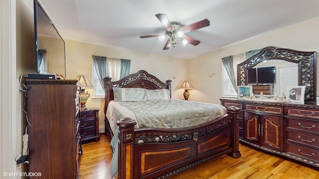 754 Wolcott Ave, Beacon, NY 12508 - bedroom with light wood-style flooring and a ceiling fan