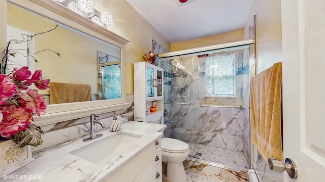 754 Wolcott Ave, Beacon, NY 12508 - bathroom with a baseboard radiator, toilet, vanity, and a marble finish shower