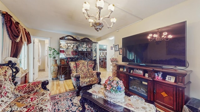 754 Wolcott Ave, Beacon, NY 12508 - living area with wood finished floors and an inviting chandelier