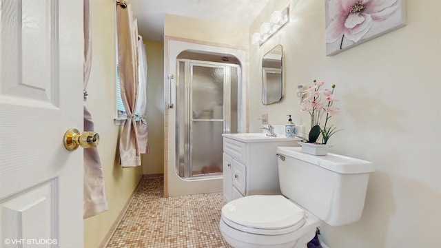 754 Wolcott Ave, Beacon, NY 12508 - full bath with a shower stall, toilet, vanity, and tile patterned floors