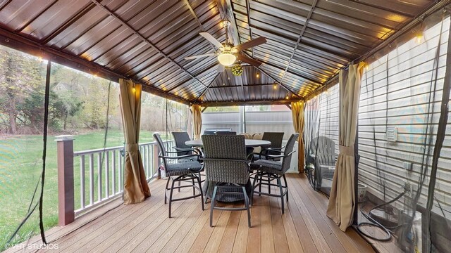 754 Wolcott Ave, Beacon, NY 12508 - wooden terrace with a gazebo, a yard, outdoor dining space, and ceiling fan