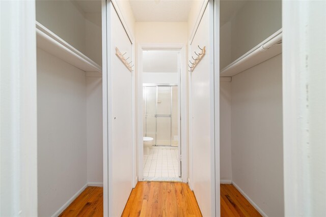 140-44 34th Ave Unit 4C, Flushing, NY 11354 - walk in closet with light wood finished floors