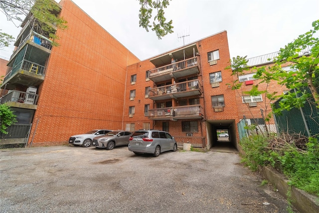 140-44 34th Ave Unit 4C, Flushing, NY 11354 - view of apartment building / complex with uncovered parking