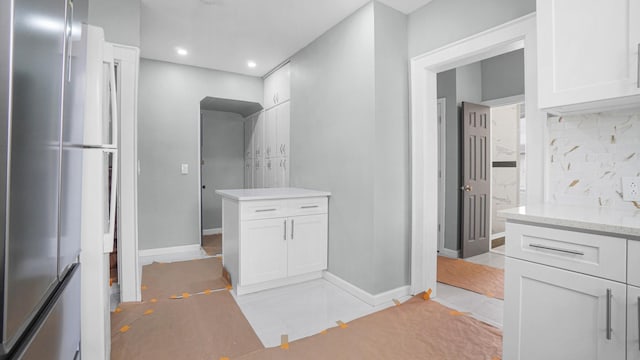 9920 196th St, Hollis, NY 11423 - bathroom with baseboards, recessed lighting, vanity, and decorative backsplash