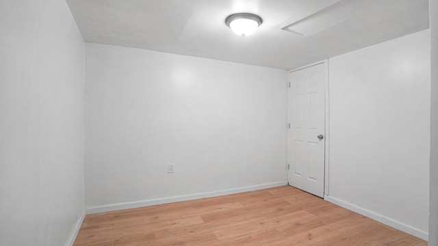9920 196th St, Hollis, NY 11423 - unfurnished room featuring baseboards and light wood finished floors