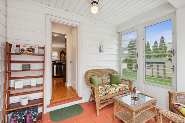 sunroom with tile patterned floors